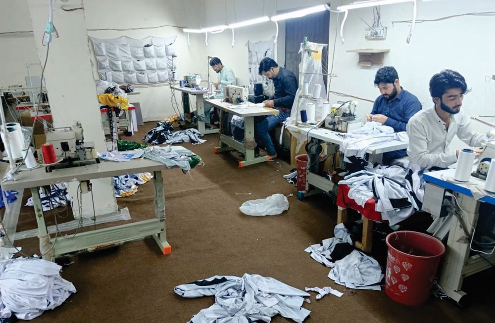 MSSONS in-house stitching hall with tailors at work